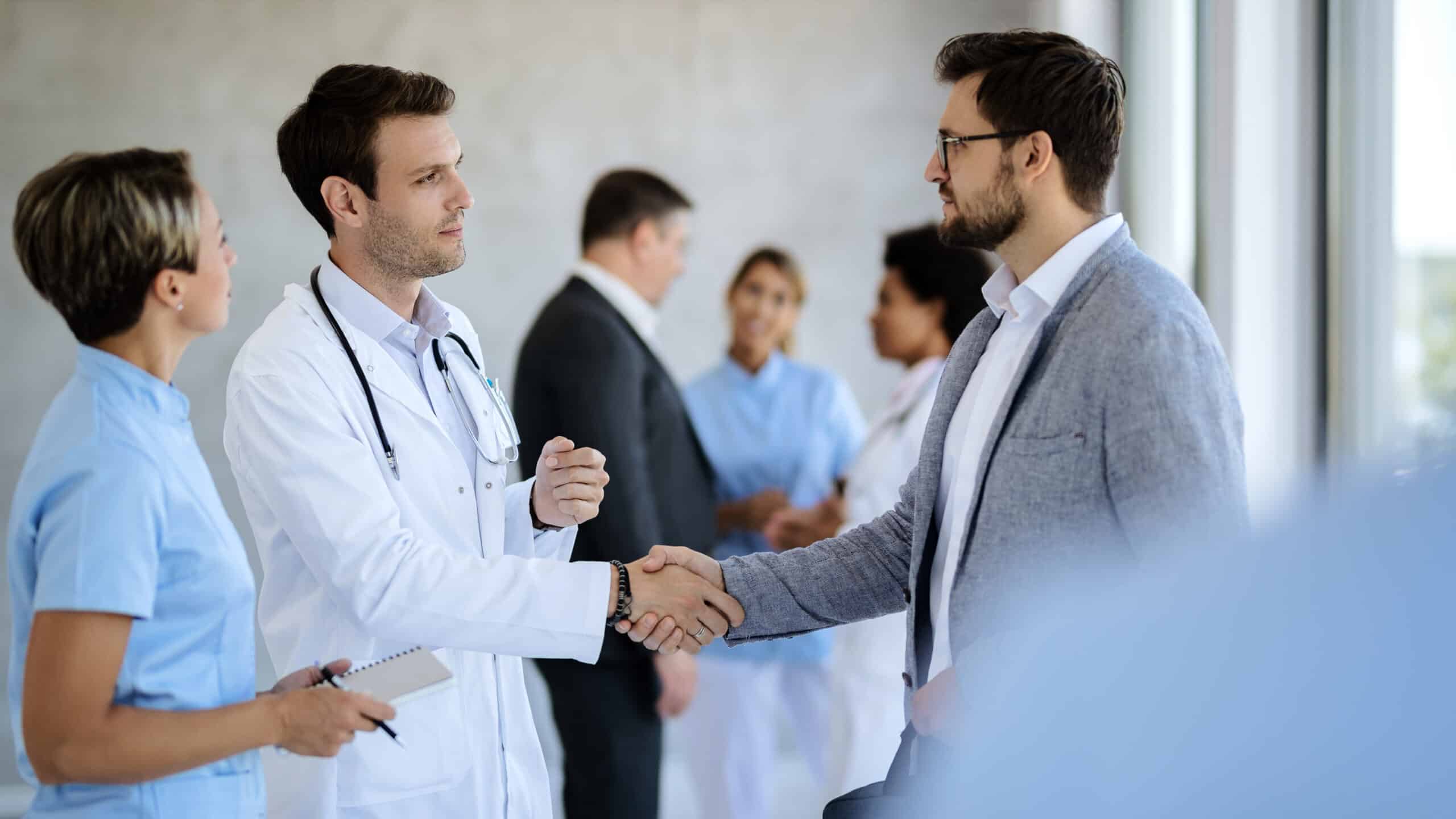 A healthcare provider meets with local partners to secure referrals and support before opening an office-based lab.